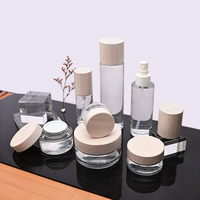 50g Color claro Claro Vidrio transparente Frasco cosmético Ceniza Tapa de madera Tapa de plástico Capacidad para el embalaje del cuidado de la piel