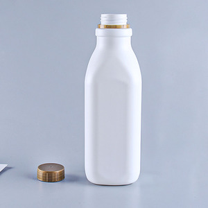 Plastica bianca 38mm diametro 1000ml bottiglia per bevande finitura opaca usa e getta per tè al latte forma rotonda guarnizione pompa quadrata per lozioni - Product Image 1