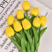 Vente en gros de fleurs artificielles PU tulipe Mini fleurs tige de fleur émulationnelle unique pour la décoration de gâteau de fête de mariage