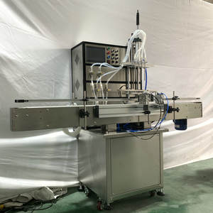 Machines de remplissage automatiques Yunqingtech à 4 têtes pour sauce chili, pâte, shampoing, savon, bouteilles en plastique, jus d'orange, miel, parfum - Product Image 2