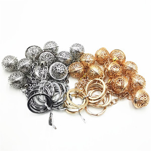 Porte-clés cloche ajouré en alliage de zinc, plaqué or blanc, pour voiture, cadeau pour petite amie, design géométrique, origine Yiwu - Product Image 1