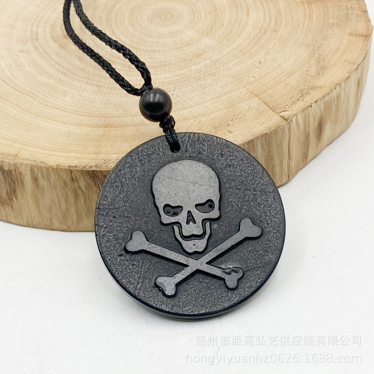 Pendentif tête