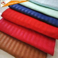 Tissu en microfibre de polyester léger gaufré à rayures 80-100 g/m² doux et respirant pour vêtements africains et produits textiles de maison