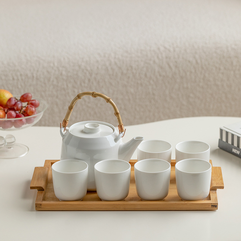 One teapot with 6 cups and tray