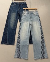Jean large taille haute pour femme avec strass scintillants et broderie en dentelle sur les côtés, disponible en deux couleurs, commande en gros