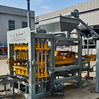 Machine à blocs de ciment multifonction QT6-15 pour blocs creux, briques pleines et pavés