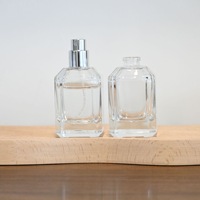 Vente en gros de flacons de parfum en verre rectangulaires transparents 30ml/50ml/100ml, flacons vaporisateurs vides de luxe avec impression sérigraphique