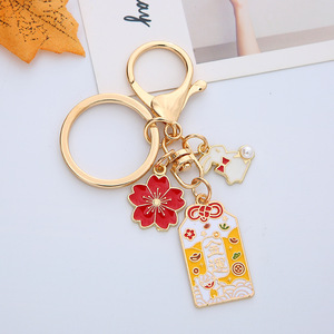 Gantungan kunci kelinci lucu keberuntungan sakura logam Enamel gantungan kunci hewan Anime gantungan kunci Fengshui tas liontin jimat gantungan kunci Jepang
