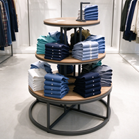 Porte-vêtements en métal noir, table ronde à niveaux, étagère grise, tringle de suspension, CE ETL, vente en gros, vente au détail, boutique
