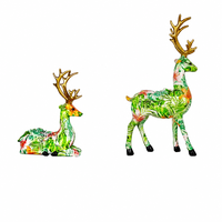 Set di 2 Statuette in Resina di Cervi con Motivi Floreali Tropicali, Scultura Dipinta a Mano con Corna Dorate, Decorazione per Casa e Soggiorno, Regalo Botanico all'Ingrosso