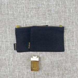 Pochette à monnaie en coton noir pas cher en gros, trousse de toilette de voyage personnalisée avec logo, sac à maquillage en toile pour femmes - Product Image 1