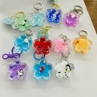OEM ODM Nouveau Vente en gros Personnalisé Créatif Mini Fleur de Sakura en Acrylique Porte-clés Flottant 3D Dessin animé Liquide Quicksand Paillettes Alliage
