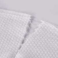 Serviettes jetables douces non tissées personnalisées en gros pour bébés et usage domestique - Sûres et écologiques pour le nettoyage du visage