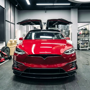 ชุดแต่งกันชนหน้า-หลัง-ข้าง รุ่นใหม่ คุณภาพสูง สำหรับ Tesla Model X ปี 16-20 แบบ RZ Style พร้อมสเกิร์ตข้าง สีดำคาร์บอน - Product Image 1