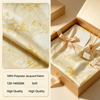 Tissu Jacquard 100% Polyester Fourniture Usine, Belle Tenue, Anti-Décoloration, Durable, Matériau Décoratif pour Revêtement de Cercueil et Doublure de Boîte Cadeau