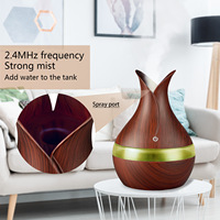 Diffuseur d'huiles essentielles aromathérapeutique avec 7 couleurs LED, mini vase à deux feuilles USB de 300 ml pour la maison et le bureau