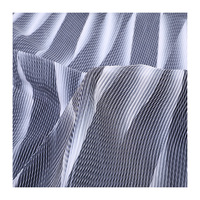 Tissu plissé imprimé à l'argent 195 g/m² 100 % polyester non extensible doré/argenté tissé pour manteau/robe