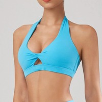 Soutien-gorge de sport respirant à séchage rapide, col en V torsadé, maintien moyen, dos ouvert, ourlet large, rembourrage amovible, idéal pour le yoga et la gym