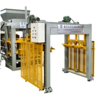 Machine à briques en béton avec système d'empilage automatique