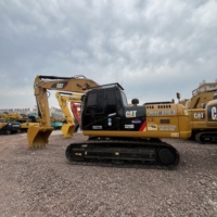Excavatrice sur chenilles Caterpillar 320D d'occasion en bon état, pièces d'origine, pour projet de construction