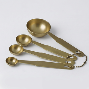 Juego de cucharas medidoras de metal, chapadas en oro, resistentes al calor, diseño minimalista, perfectas para medir y uso elegante en la cocina. - Product Image 1