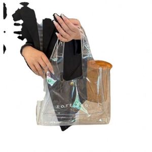 กระเป๋าโท้ท PVC แฟชั่นใหม่แบบสั่งทำพิเศษ พร้อมกระดุมแป๊ก กระเป๋าสะพายไหล่ใสสำหรับชายหาด เหมาะสำหรับสินค้าส่งเสริมการขาย - Product Image 3