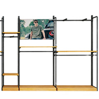 Étagère d'exposition élégante et durable à prix bas, design élégant, multifonctionnelle, pour magasin de vêtements de sport