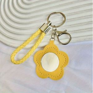 Wholesale <b>Cute</b> Flower PU Leather Mirror Keychain Portable Cosmetic Mirror Bag Pendant Customizable Fashion Bag Charm <b>Keyring</b> - Product Image 2