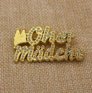 Cheap Custom Cut Out Letter Badge Gold 2D Embossed Lapel Pin with Crystal