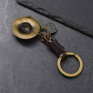 Accesorios de tejido genuinos para colgar en bolsos, regalos al por mayor, colgante de lazo retro para sombrero de paja, llavero de metal - Product Image 4