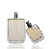 En stock – Flacon de parfum rectangulaire en verre transparent de luxe 30ml/50ml/100ml avec pompe pulvérisatrice en aluminium et sérigraphie pour sérum de soin et parfum