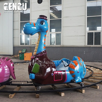 Mignon petit train de dinosaures en métal d'intérieur pour les enfants pour les lieux publics comme les centres commerciaux, les aéroports, les garderies et les jardins d'enfants