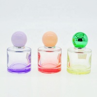 Petit flacon de parfum en verre cylindrique coloré de 30 ml, vente chaude, ODM, vente en gros, emballage cosmétique avec bouchon à bille et pulvérisateur à brume