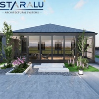 Véranda en aluminium et verre design avec finition thermolaquée disponible en couleurs RAL personnalisées et traitements de surface de qualité supérieure