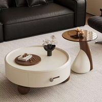 Table basse créative arrondie avec rangement intégré pour hôtel et maison