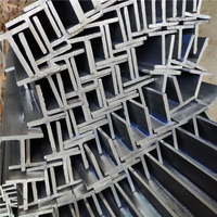 Rouleau linéaire étirage à froid T Type tailles fabricants de rails de guidage d'ascenseur en acier soulever des pièces de rechange