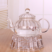 Théière en verre transparent à haute teneur en borosilicate de style classique stockée à la main, sûre pour la cuisinière avec infuseur, bouilloire à thé d'une capacité de 600ml