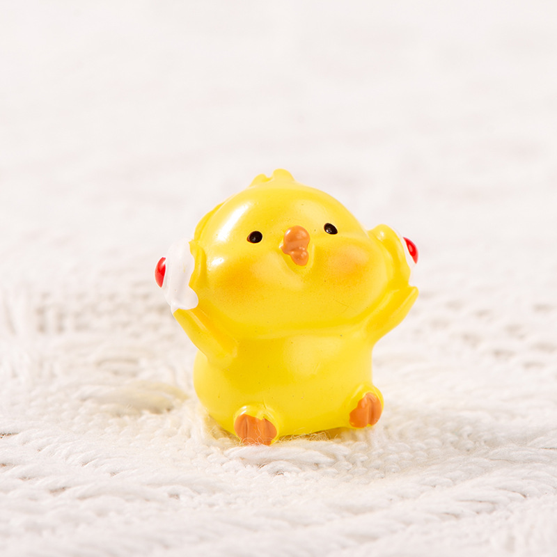 Petit poussin jaune écoutant de la musique