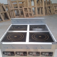 Table de cuisson à induction commerciale à 4 foyers avec pare-éclaboussures, contrôle par bouton, pour cuisine professionnelle