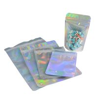 Pochette debout holographique en mylar avec logo personnalisé imprimé holographique pochette Doypack en plastique anti-odeur au laser