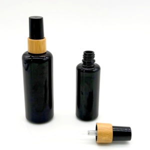 50ml Black Glass <strong>Spray</strong> Bottle with Bamboo Lids Luxury 30ml 50ml Black <strong>Spray</strong> Glass Bottle Round Cheap Oil Glass <strong>Spray</strong> Bottles - Product Image 1