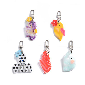 Peigne à cheveux miniature en acétate YJL, mignon, en forme d'animal, d'oiseau, porte-clés, peigne portable en acétate, <span class=keywords><strong>poisson</strong></span>-<span class=keywords><strong>cheval</strong></span>, accessoires pour cheveux en gros pour femmes - Product Image 1