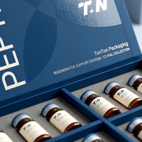 Boîte rigide personnalisée bleu marine et gris en carton ondulé pour 3 flacons de peptides, impression offset sur pulpe moulée, soins personnels