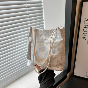 Sac à bandoulière en losange brodé pour femmes sac à épaule de couleur