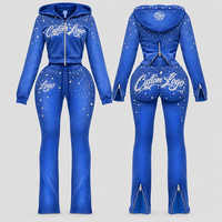 Ensemble de survêtement vintage 2 pièces pour femme avec logo personnalisé du fabricant OEM, respirant, comprenant un sweat à capuche court et un pantalon de survêtement à taille élastique et ourlet fendu