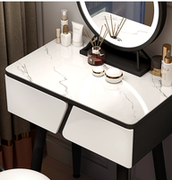 Vente en gros en usine Miroir Led rond élégant et contemporain Tiroirs de conception géométrique uniques Coiffeuse à pieds noirs