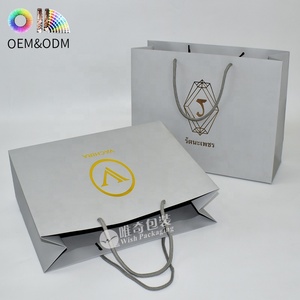 Cao cấp màu xám túi giấy với ngọc trai dập nổi kết cấu tùy chỉnh in Matte nhiều lớp <span class=keywords><strong>b</strong></span>ề mặt lá vàng dập và nylon xử lý - Product Image 5