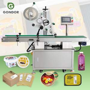 Système d'étiquetage automatique de dessus, de côté et de bas pour sacs plats avec alimentateur pour étiquettes transparentes - Product Image 1