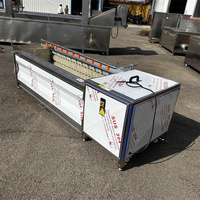 Machine industrielle automatique de pelage de pommes de terre et de manioc, et de nettoyage/lavage des légumes-racines