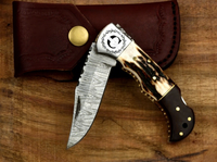 Couteau pliant de luxe OEM multifonctionnel pour l'extérieur, en acier Damas, à lame coulissante, pointe biseautée, manche en corne de cerf et bois de rose